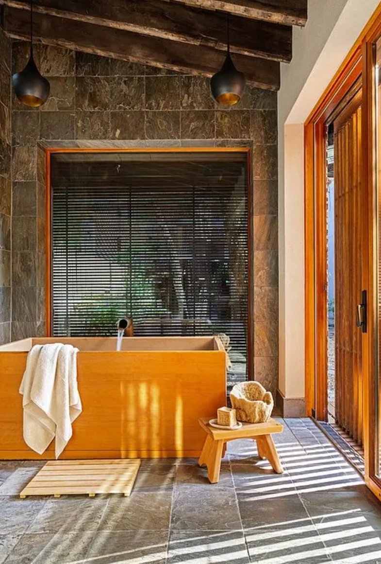 Japanese onsen-style wooden tub in the guest house
